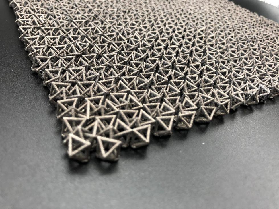 A material inspired by chainmail can transform from a foldable, fluid-like state into specific solid shapes