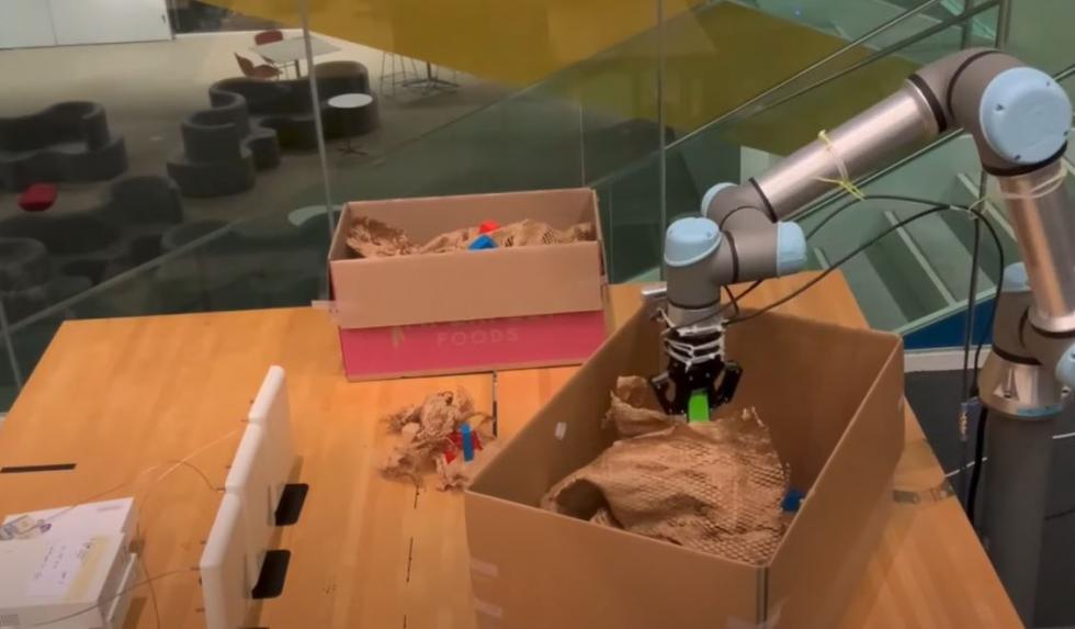 RF Grasp: The robot that finds its way through clutter