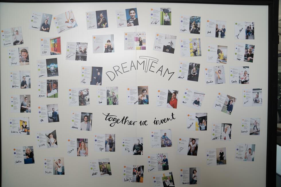Dream Team wall with all Creaholic employees