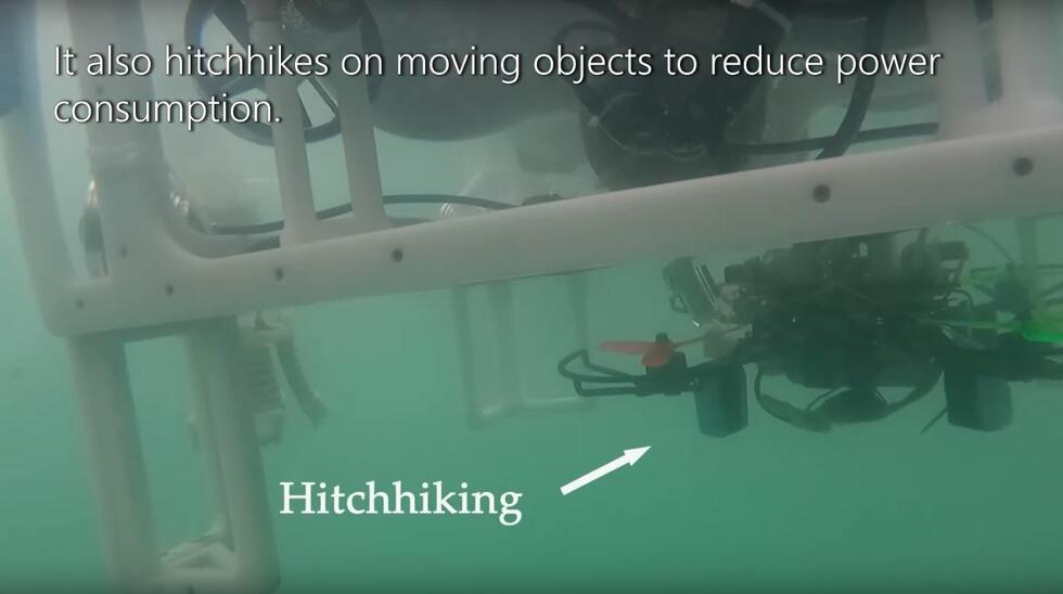 A drone attaches itself to another object underwater