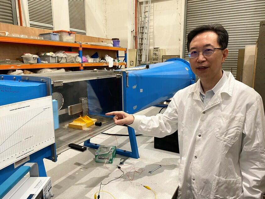 NTU professor Yang Yaowen with the device that harnesses wind energy.