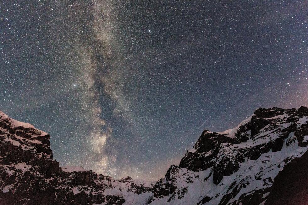 The milky way with mountains in foreground