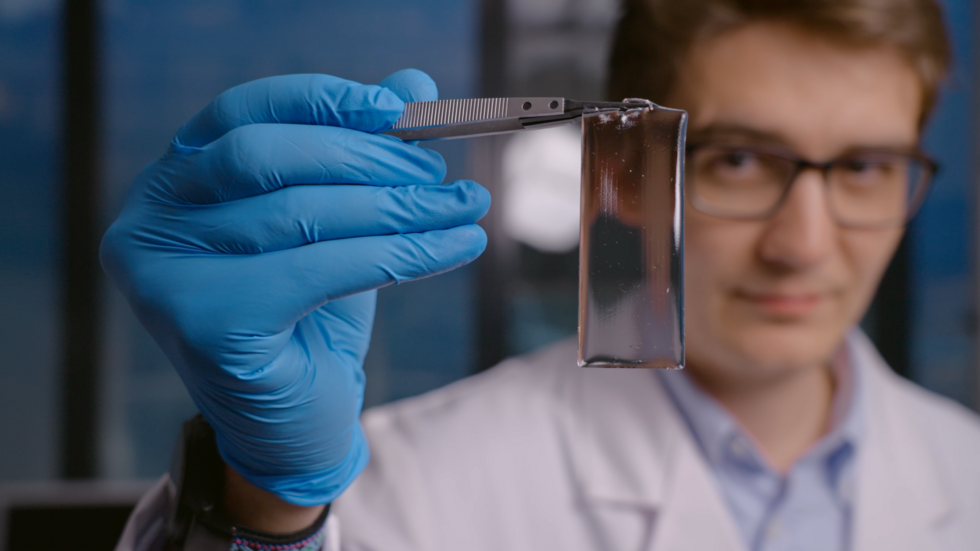 A scientist holding the patch developed by Empa