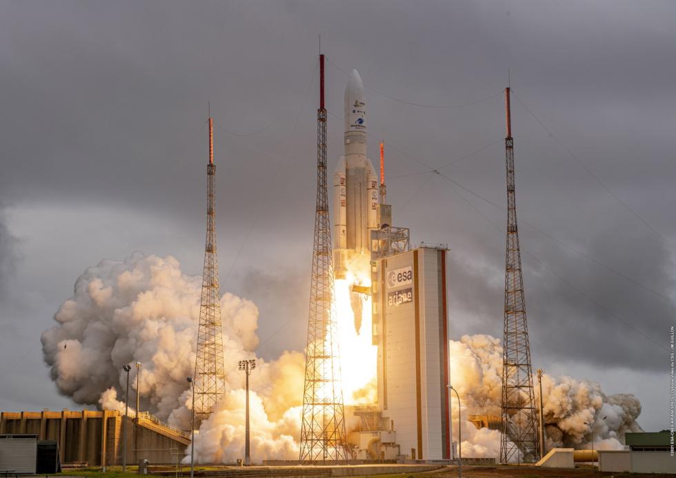 A handout picture made available by ESA/CNES/Arianespace shows the lift-off of Arianespace's Ariane 5 rocket carrying NASA's James Webb Space Telescope, in the Jupiter Center at the Guiana Space Center in Kourou, French Guiana, 25 December 2021.
