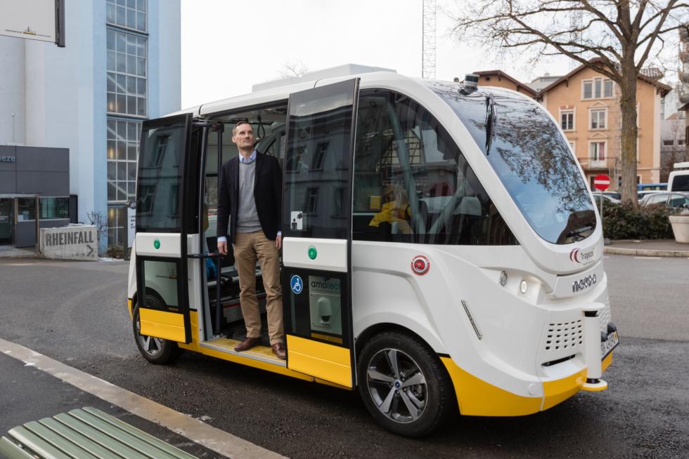 Thomas Sauter-Servaes and an autonomous taxi